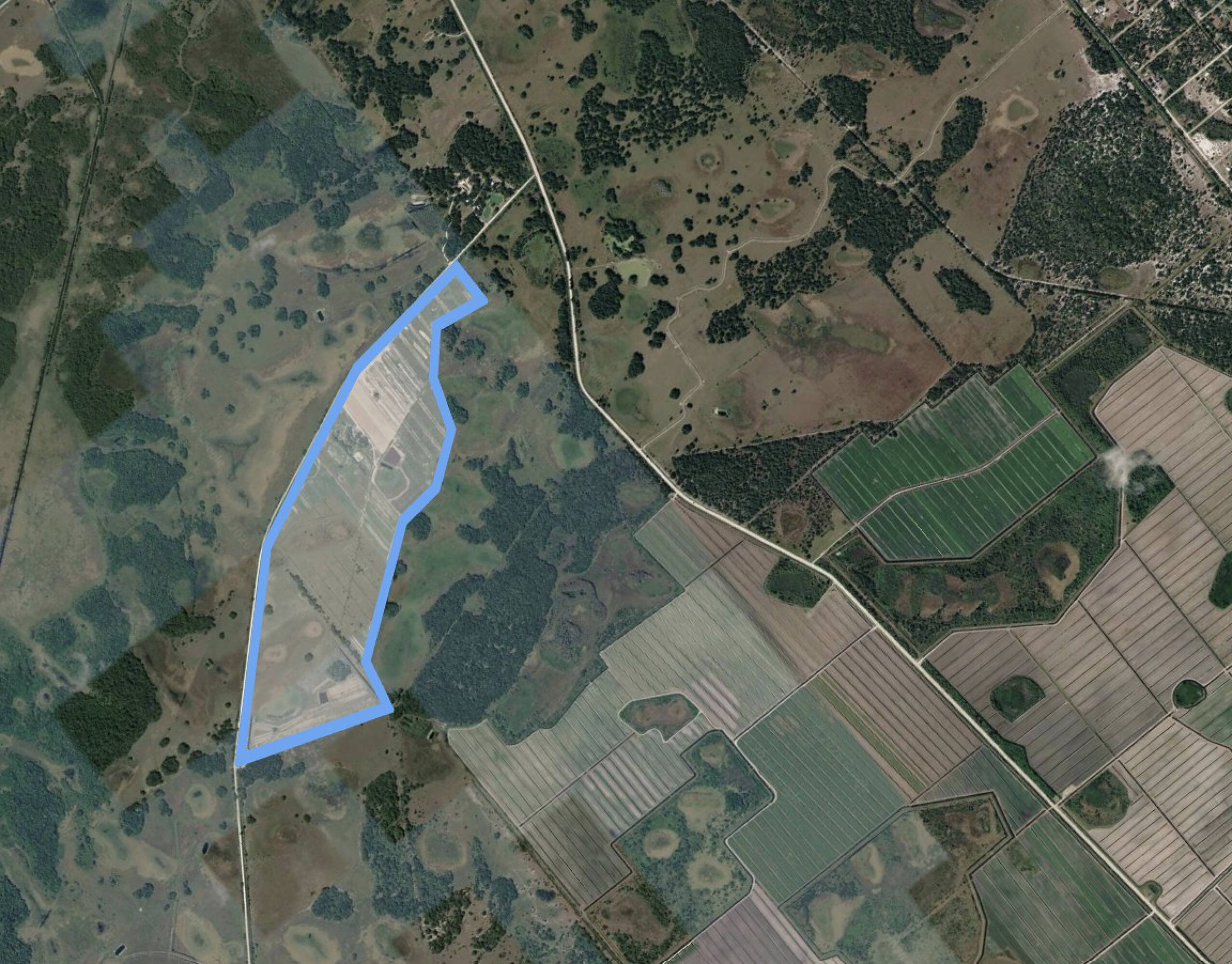 Satellite map showing the outlined boundary of the 326-acre property
